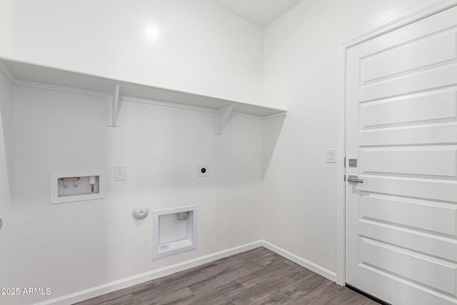 washroom with hookup for a gas dryer, hardwood / wood-style flooring, hookup for an electric dryer, and washer hookup