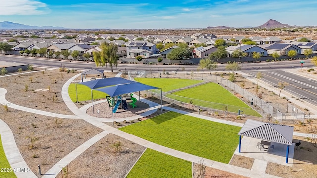 birds eye view of property with a mountain view