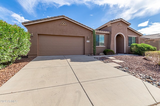 view of front of home with a garage