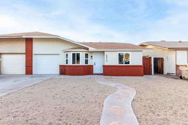 ranch-style home with a garage