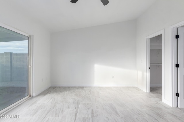 unfurnished room with ceiling fan