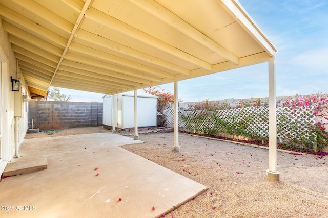 view of patio / terrace featuring a shed