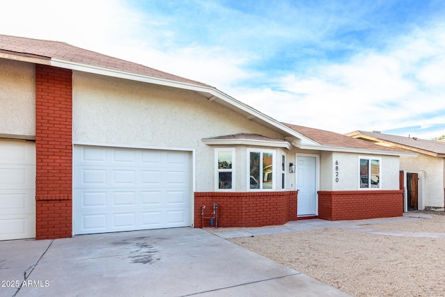 single story home featuring a garage