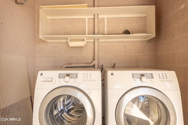 laundry area with washer and clothes dryer