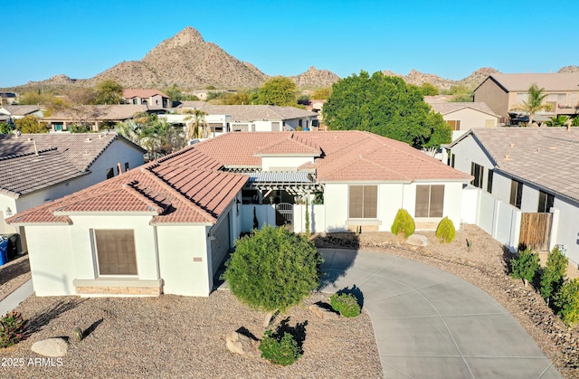 view of front of property with a mountain view