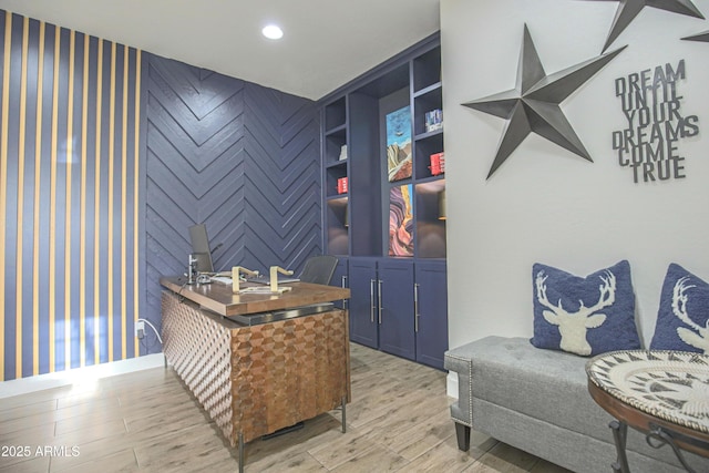 office space with light wood-type flooring