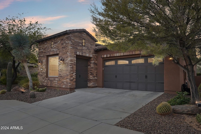 view of front of house with a garage