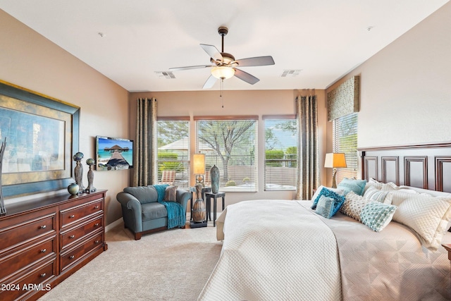 carpeted bedroom with ceiling fan