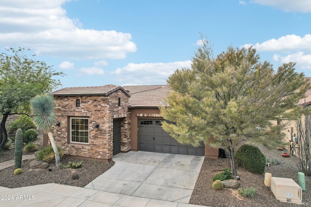 view of front of property featuring a garage