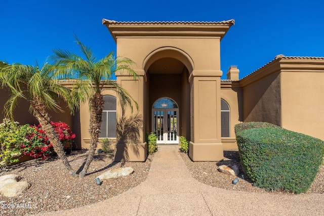 doorway to property with french doors