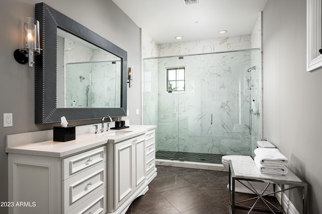 bathroom featuring vanity, toilet, and a shower with shower door