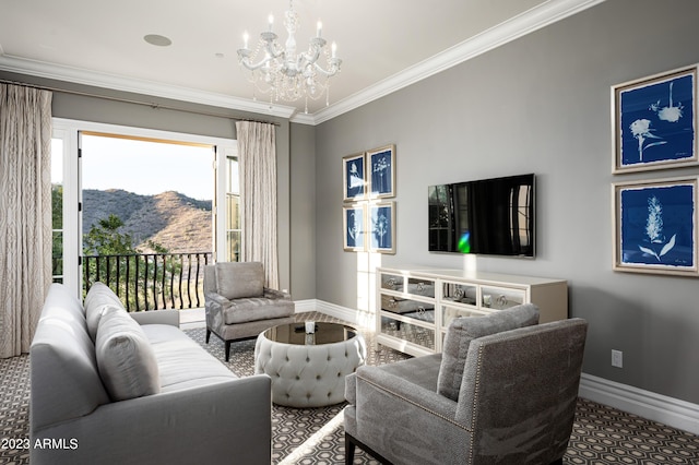 living room with crown molding and a chandelier