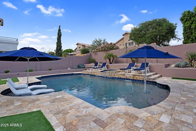 view of swimming pool featuring a patio, a fenced backyard, and a fenced in pool