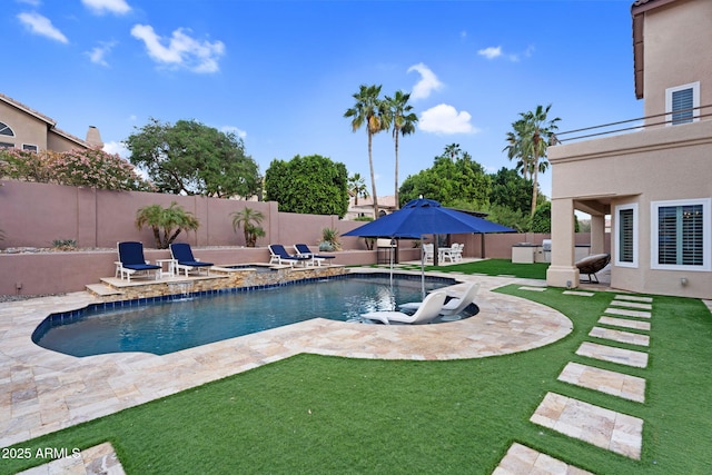 view of pool featuring a fenced in pool, a lawn, a fenced backyard, and a patio area