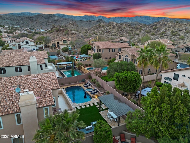 bird's eye view featuring a mountain view and a residential view