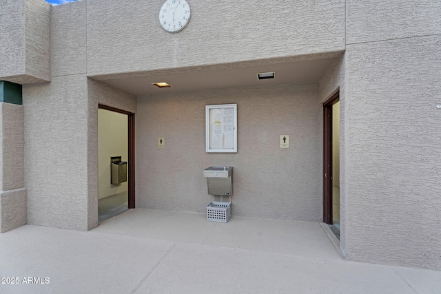 exterior space with stucco siding