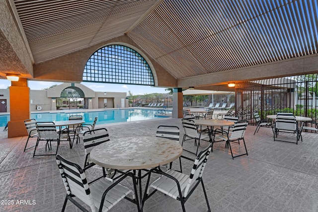 community pool with a patio