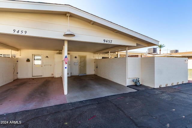 garage featuring a carport