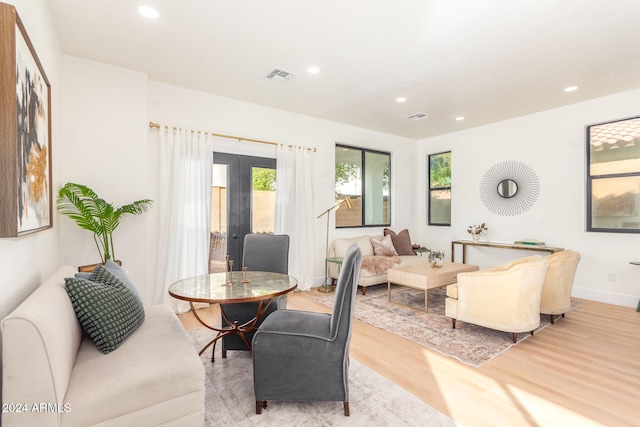 interior space featuring french doors and light wood-type flooring