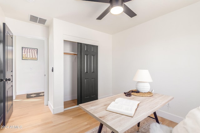 office area featuring light hardwood / wood-style flooring and ceiling fan