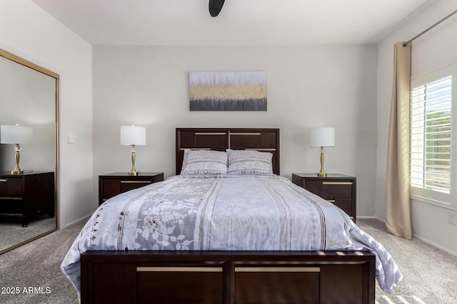 bedroom with ceiling fan, a closet, and carpet flooring