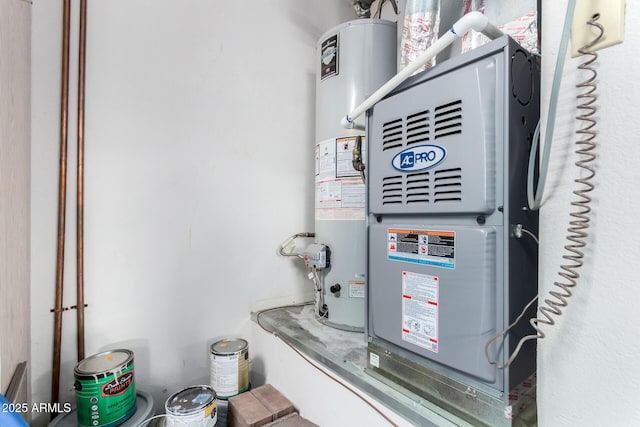 utility room featuring gas water heater and heating unit