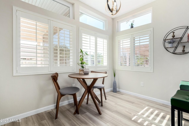 dining space featuring light hardwood / wood-style flooring