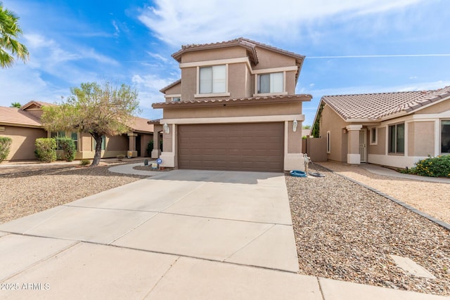 13001 W Bloomfield Rd, El Mirage, AZ 85335 - mediterranean / spanish house with driveway, stucco siding, a tile roof, and an attached garage