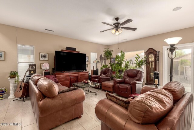 13001 W Bloomfield Rd, El Mirage, AZ 85335 - living room with light tile patterned flooring, visible vents, and ceiling fan