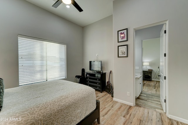 bedroom with light wood-type flooring and ceiling fan