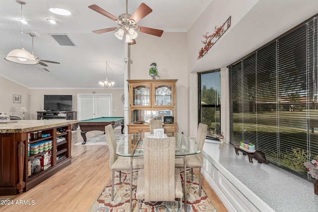 dining space featuring ceiling fan with notable chandelier, ornamental molding, light hardwood / wood-style floors, and billiards