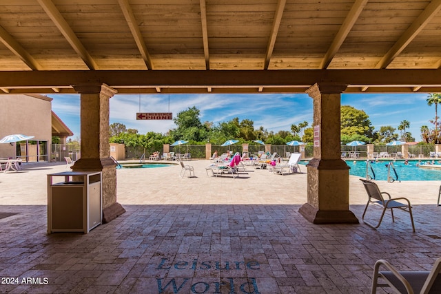 view of terrace featuring a community pool