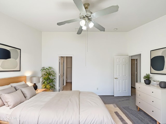 carpeted bedroom featuring ceiling fan