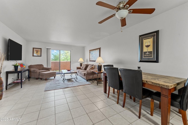 tiled dining space with ceiling fan