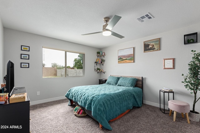 5702 S Beck Ave, Tempe, AZ 85283 - carpeted bedroom featuring baseboards, ceiling fan, a textured ceiling, and visible vents
