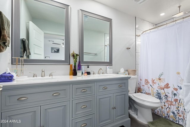5702 S Beck Ave, Tempe, AZ 85283 - bathroom with double vanity, a sink, and toilet