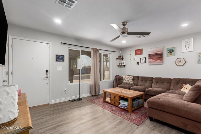 5702 S Beck Ave, Tempe, AZ 85283 - living room featuring visible vents, a ceiling fan, and wood finished floors