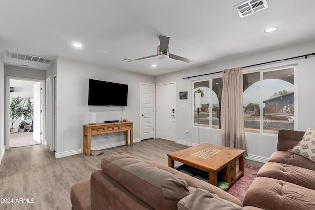 5702 S Beck Ave, Tempe, AZ 85283 - living room featuring visible vents, baseboards, and wood finished floors