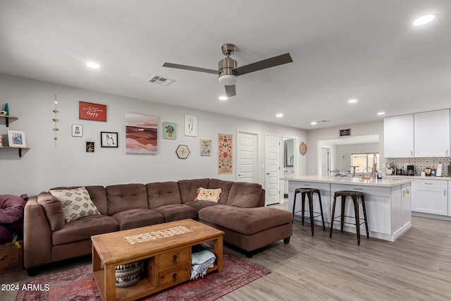 5702 S Beck Ave, Tempe, AZ 85283 - living room featuring visible vents, a ceiling fan, recessed lighting, and light wood-type flooring