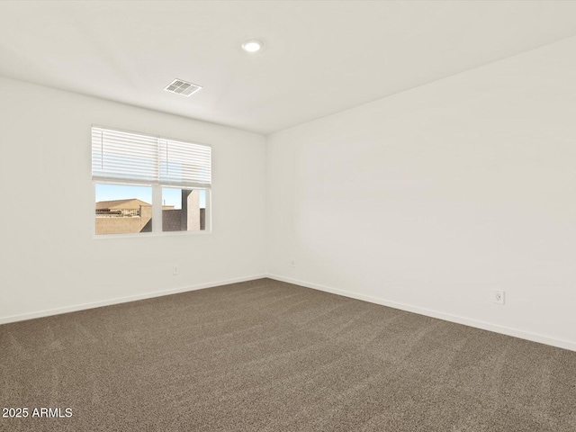 spare room with carpet flooring