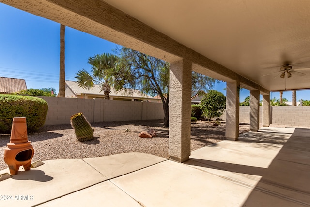 view of patio featuring ceiling fan