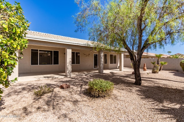 rear view of property with a patio area