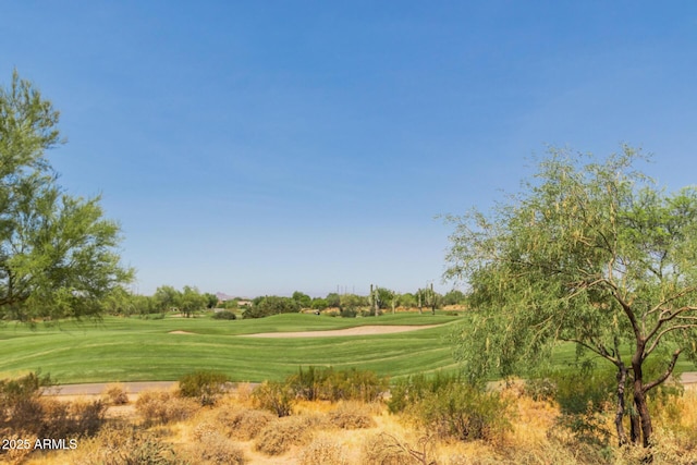 surrounding community featuring a lawn