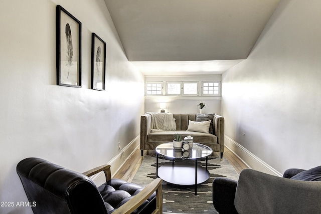 sitting room with hardwood / wood-style floors