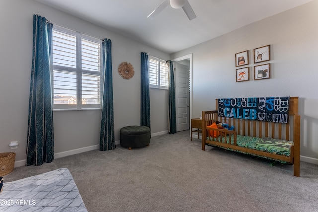 bedroom featuring ceiling fan and carpet flooring