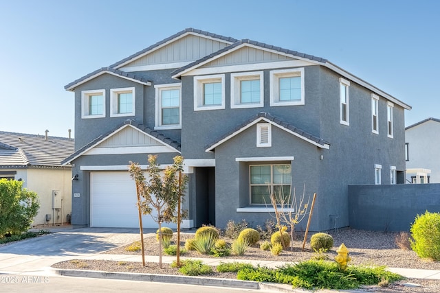 view of front of property with a garage