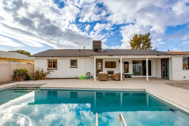 back of house with a patio, central air condition unit, an outdoor hangout area, fence, and an outdoor pool