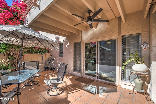 view of patio featuring ceiling fan