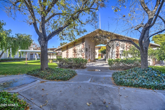 exterior space with a lawn