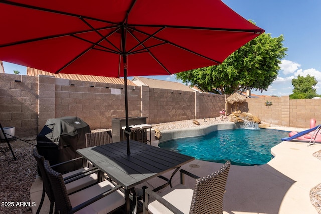 7826 W Mcrae Way, Glendale, AZ 85308 - view of pool with area for grilling, a fenced backyard, a patio, and outdoor dining area